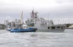 ID 6226 HMNZS TE KAHA (F77) berths at the Royal New Zeland Navy base in Devonport, Auckland, NZ. She is assisted by the Ports of Auckland tug WAKA KUME.